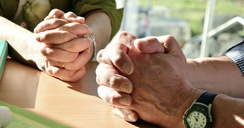 Faith healing Hands in prayer